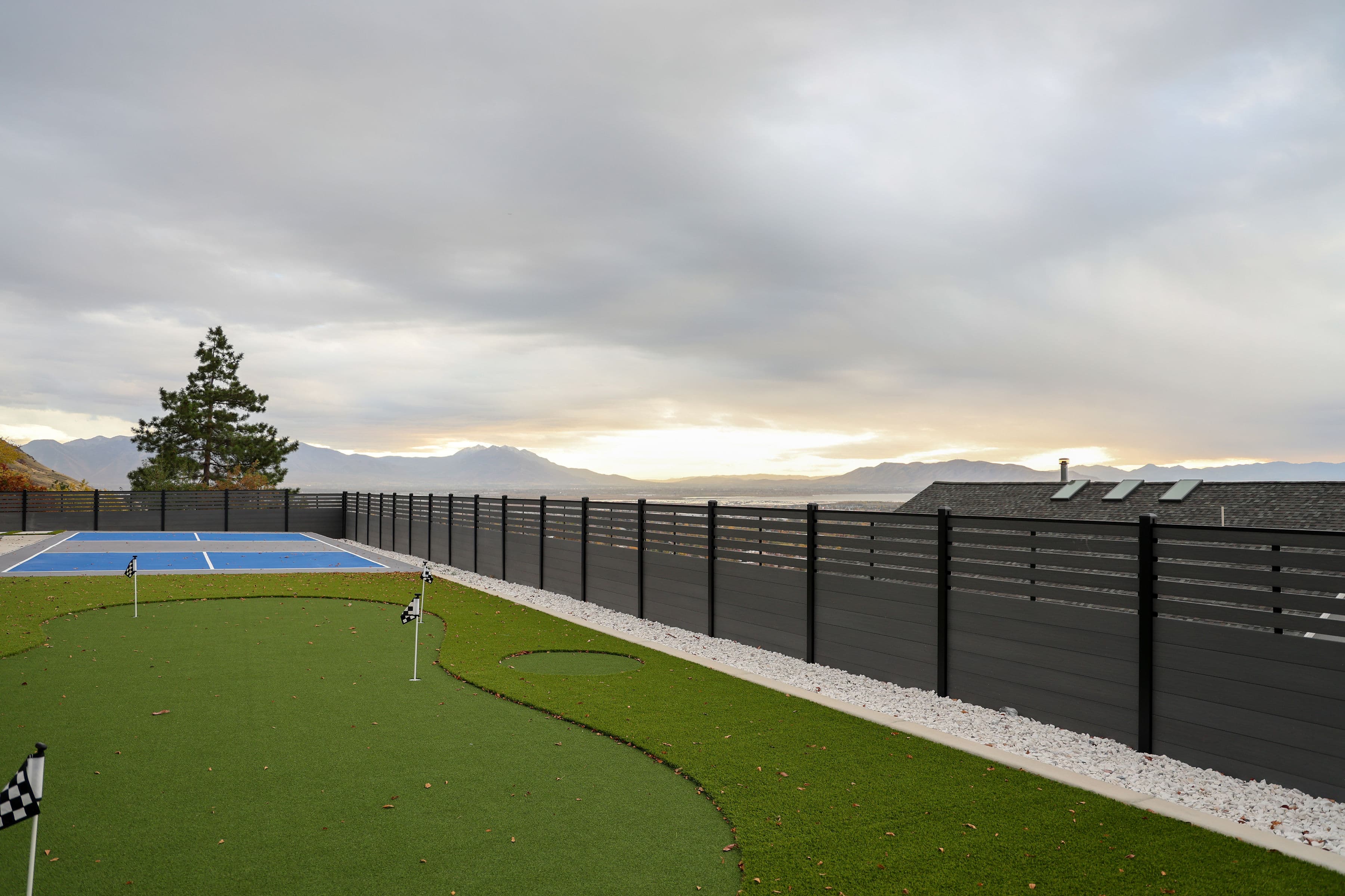 Composite fence installation crew on site